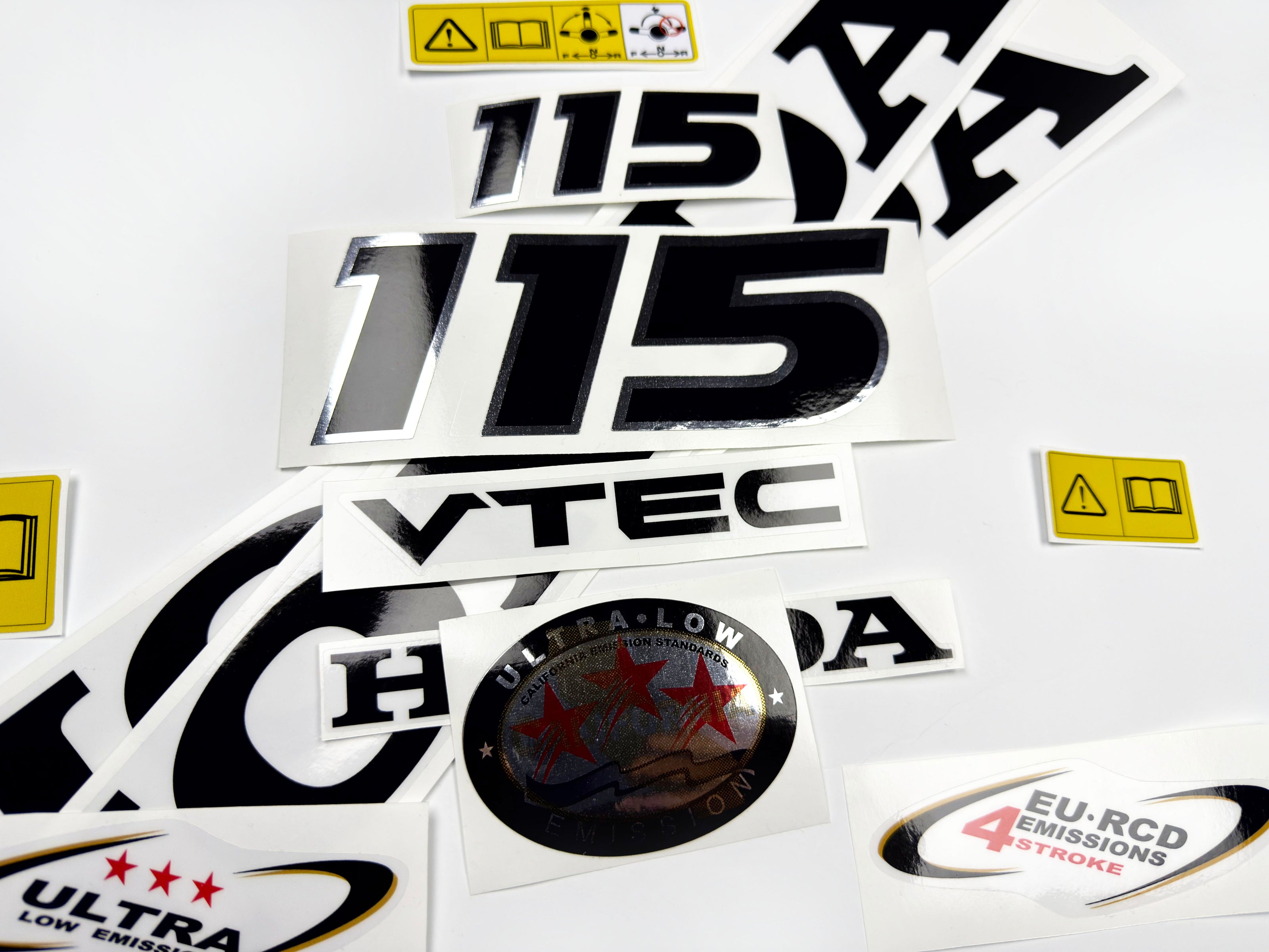 Vinyl graphic decals set chrome color suitable for Honda VTEC 115 hp four stroke outboard engine. Vinyl stickers kit for Honda 115 hp four stroke Handmade