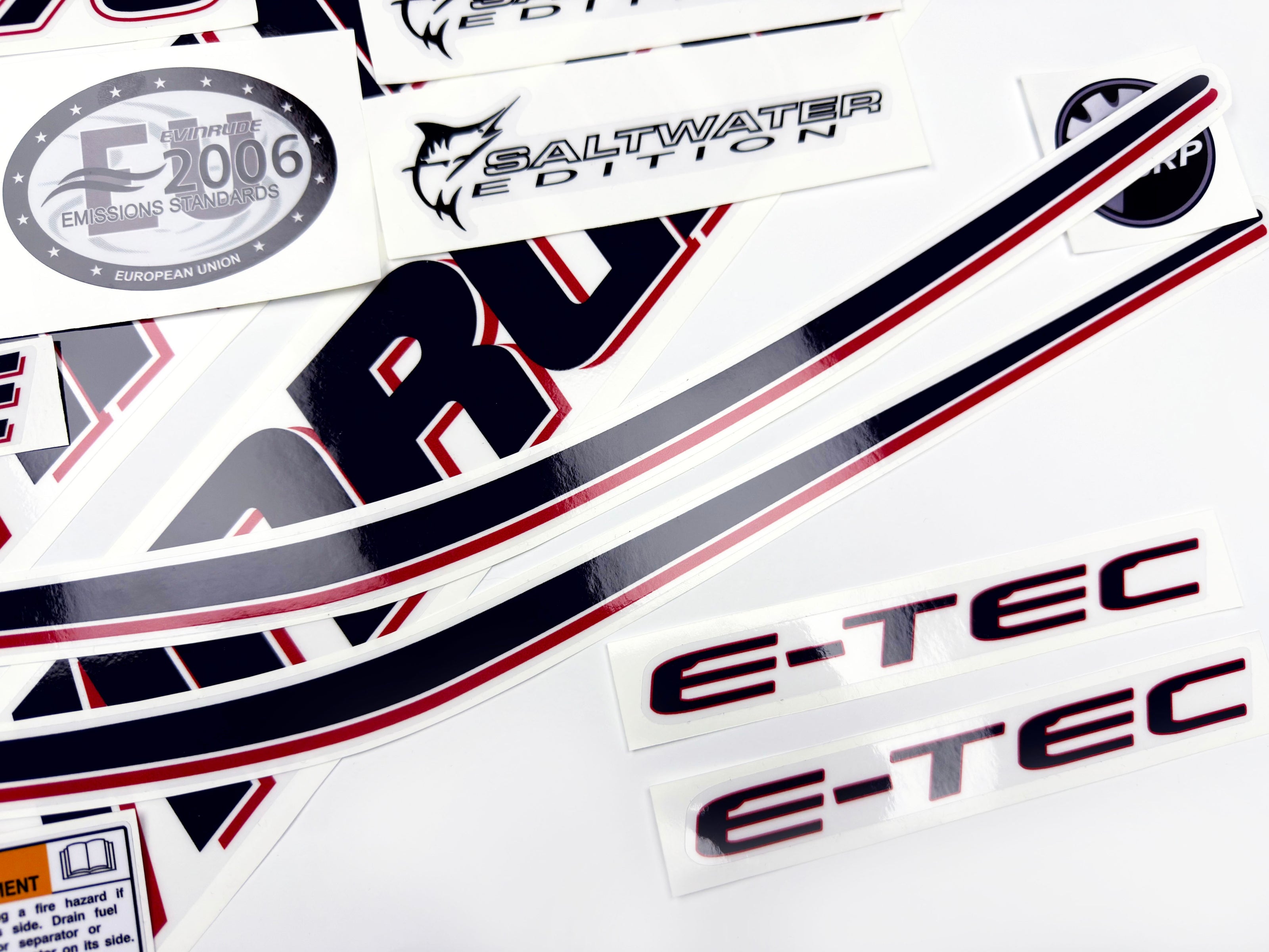 Vinyl graphic decals set suitable for Evinrude 75 hp two stroke outboard engine on transparent film for a white hood cover cowling . Vinyl stickers kit for Ewinrude 75 hp two stroke Handmade