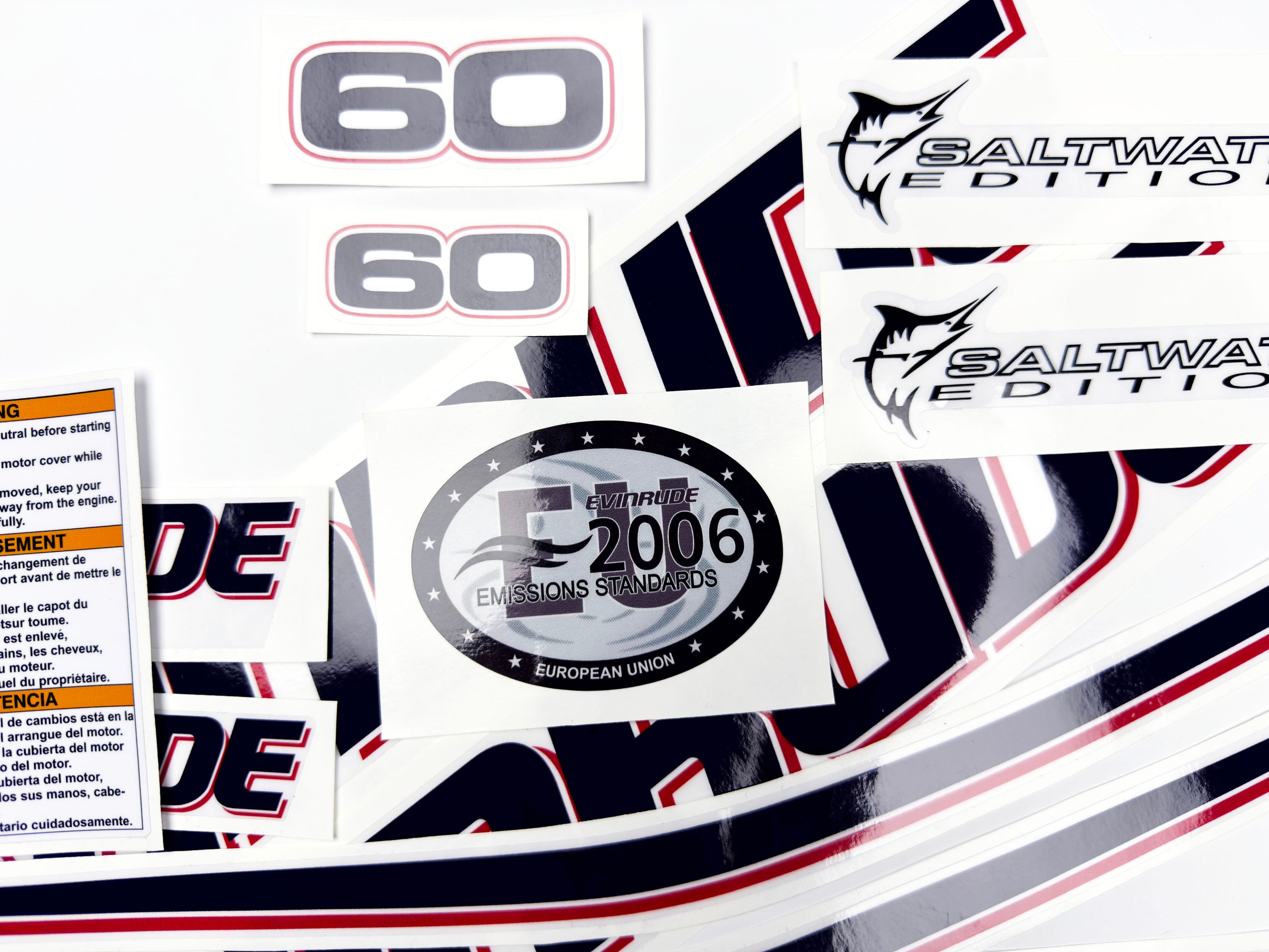 Vinyl graphic decals set suitable for Evinrude 60 hp two stroke outboard engine on transparent film for a white hood cover cowling . Vinyl stickers kit for Ewinrude 60 hp two stroke Handmade