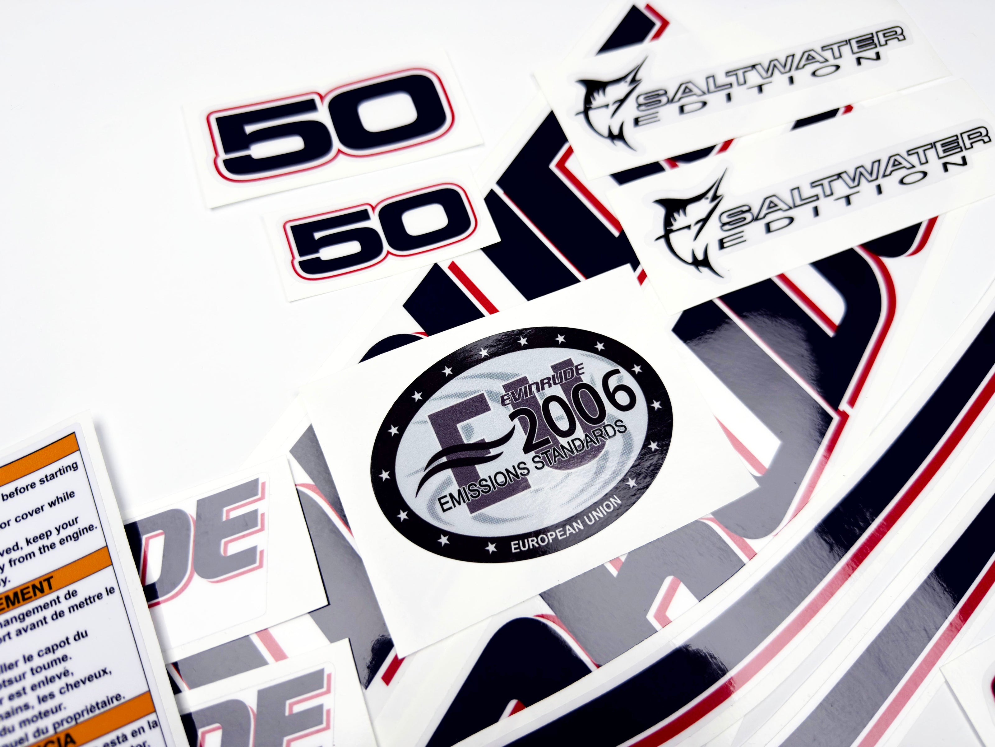 Vinyl graphic decals set suitable for Evinrude 50 hp two stroke outboard engine on transparent film for a white hood cover cowling . Vinyl stickers kit for Ewinrude 50 hp two stroke Handmade