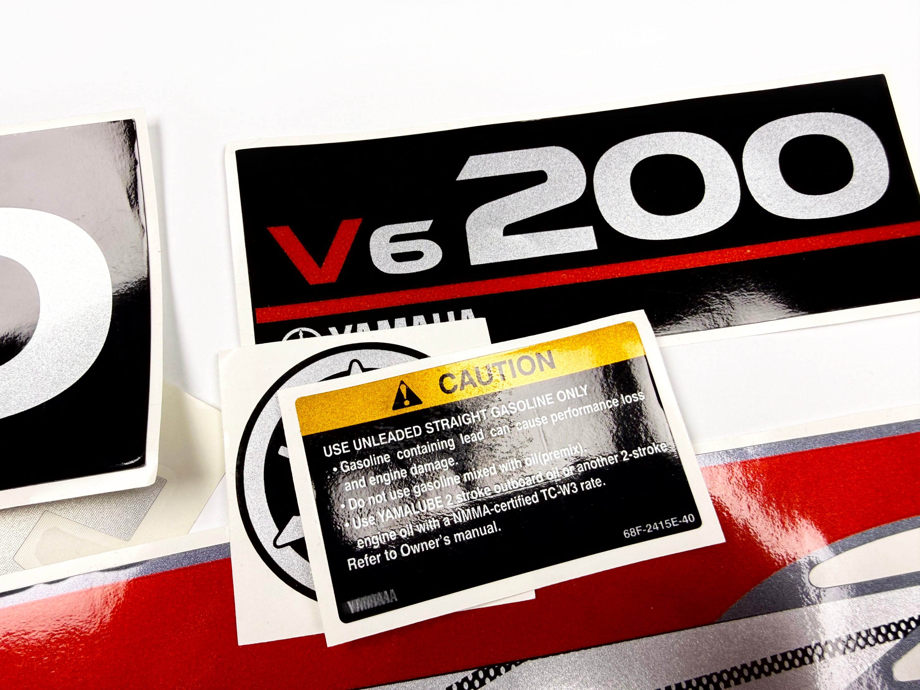 Vinyl graphic metalized silver whith red shimmer decals set suitable for Yamaha 200 hp two stroke outboard engine. Vinyl stickers kit for Yamaha 200 hp two stroke Handmade