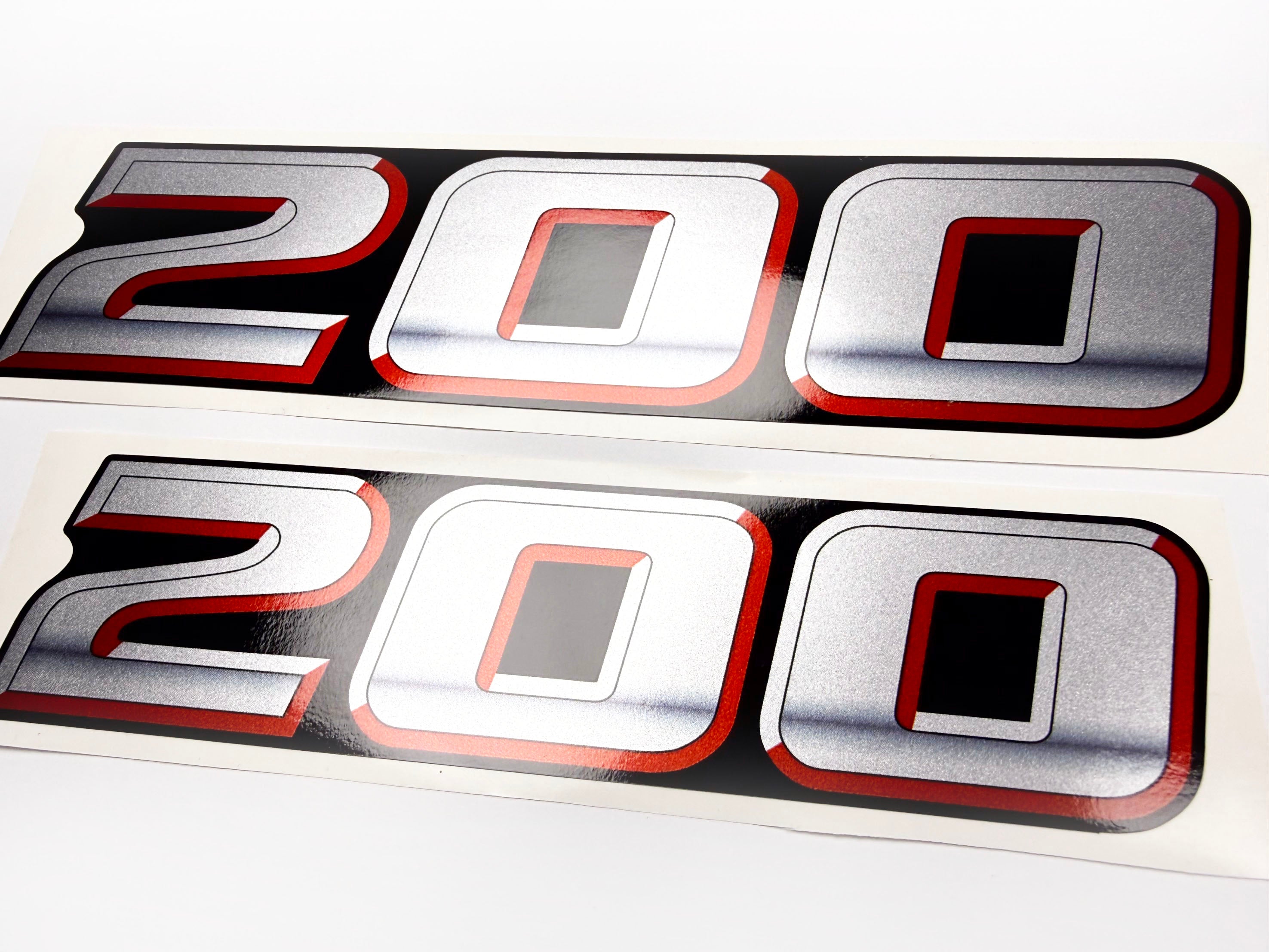 Vinyl graphic silver metalized shimmer decal numbers set suitable for Suzuki 200 hp four stroke outboard engine. Vinyl stickers number for suzuki 200 hp four stroke Handmade