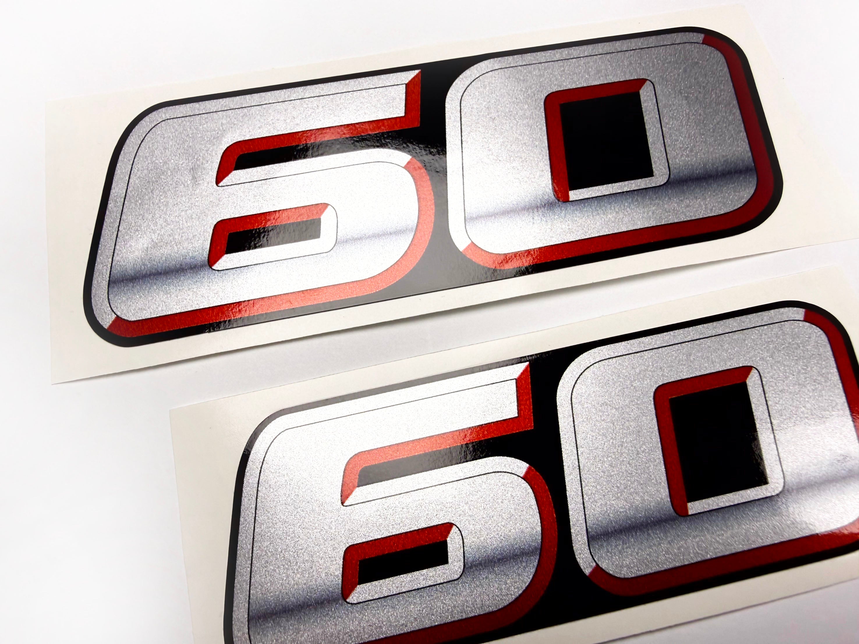 Vinyl graphic silver metalized shimmer decal numbers set suitable for Suzuki 60 hp four stroke outboard engine. Vinyl stickers number for suzuki 60 hp four stroke Handmade