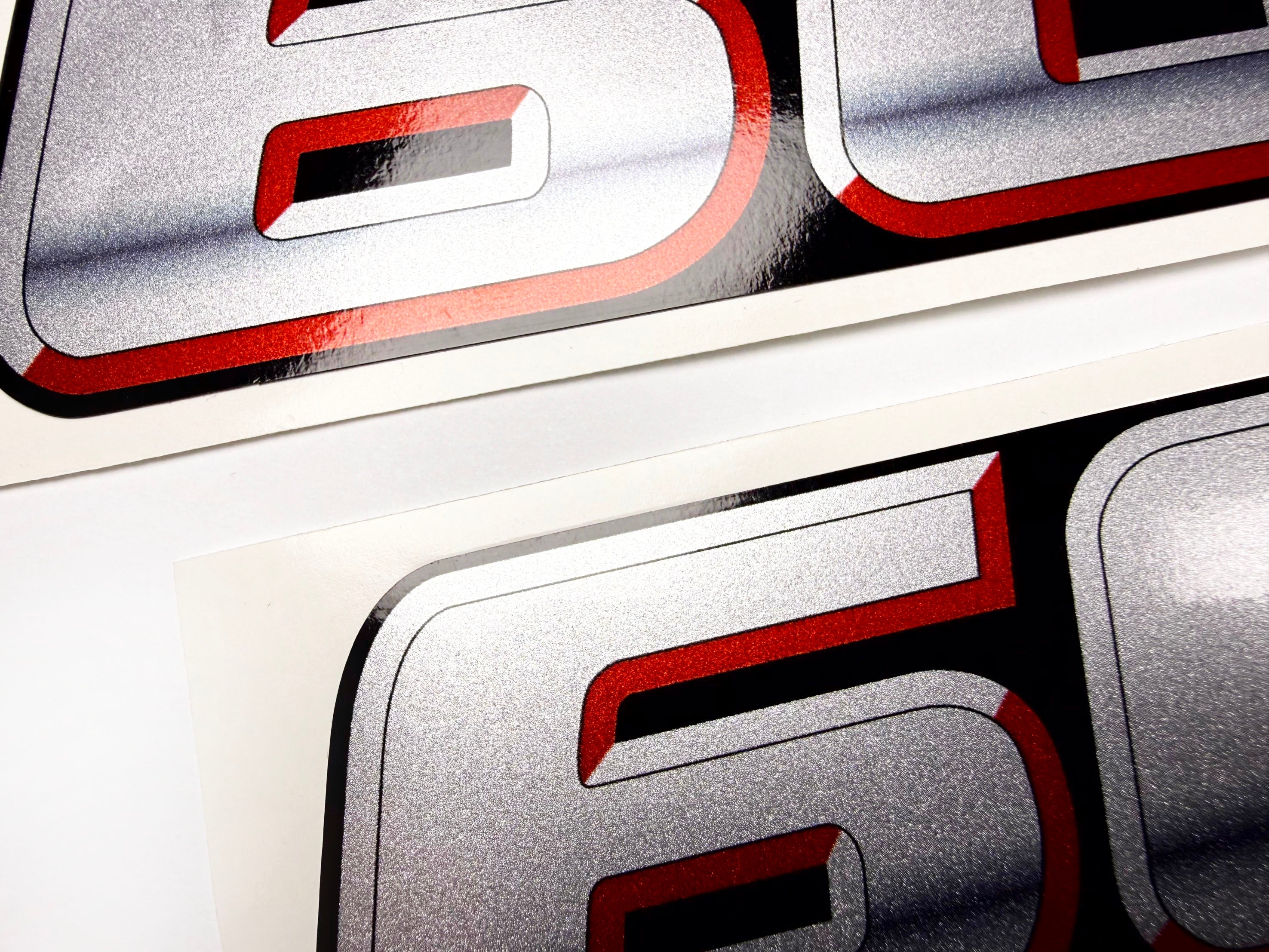 Vinyl graphic silver metalized shimmer decal numbers set suitable for Suzuki 60 hp four stroke outboard engine. Vinyl stickers number for suzuki 60 hp four stroke Handmade