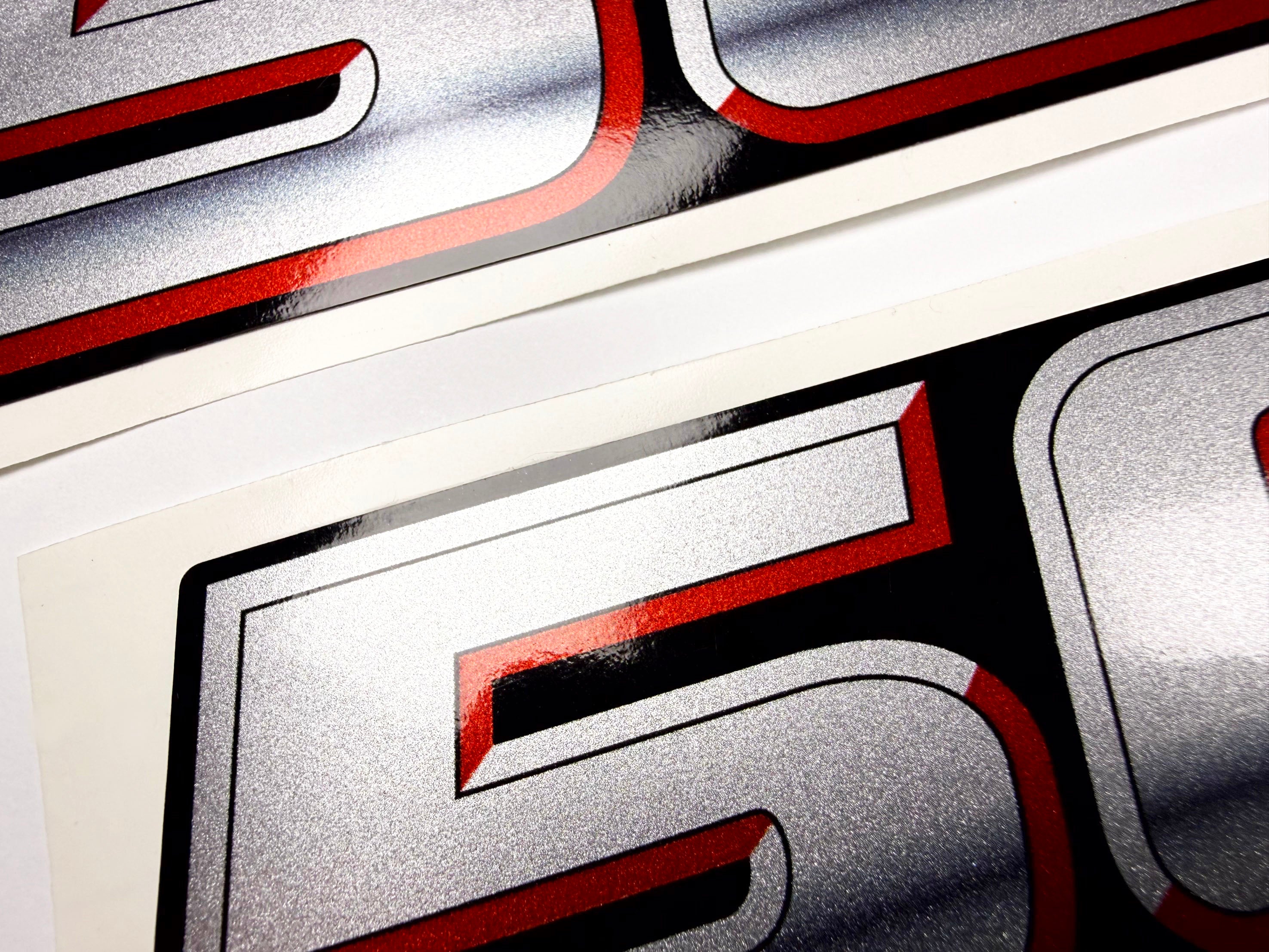 Vinyl graphic silver metalized shimmer decal numbers set suitable for Suzuki 50 hp four stroke outboard engine. Vinyl stickers number for suzuki 50 hp four stroke Handmade
