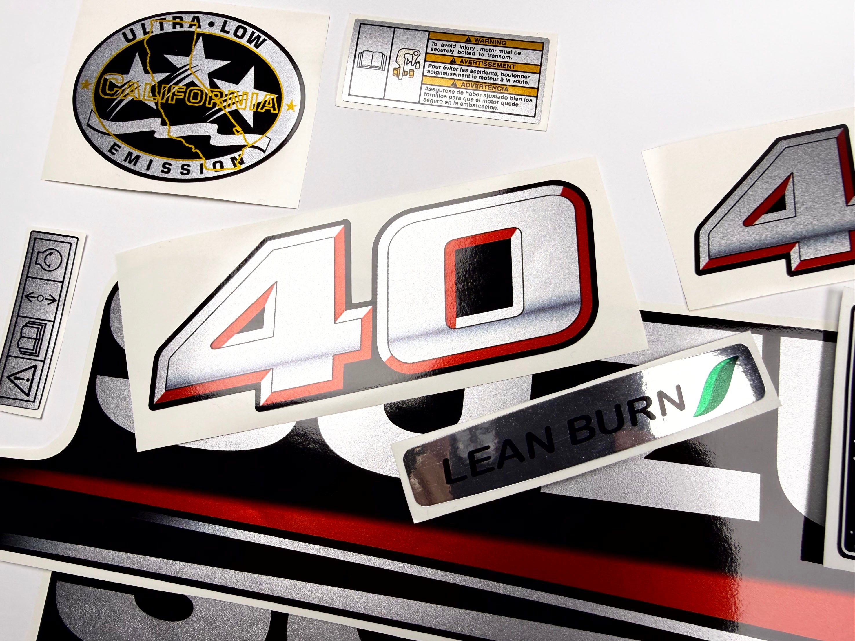 Vinyl graphic silver metalized shimmer decals set suitable for Suzuki 40 hp four stroke outboard engine. Vinyl stickers kit for suzuki 40 hp four stroke Handmade