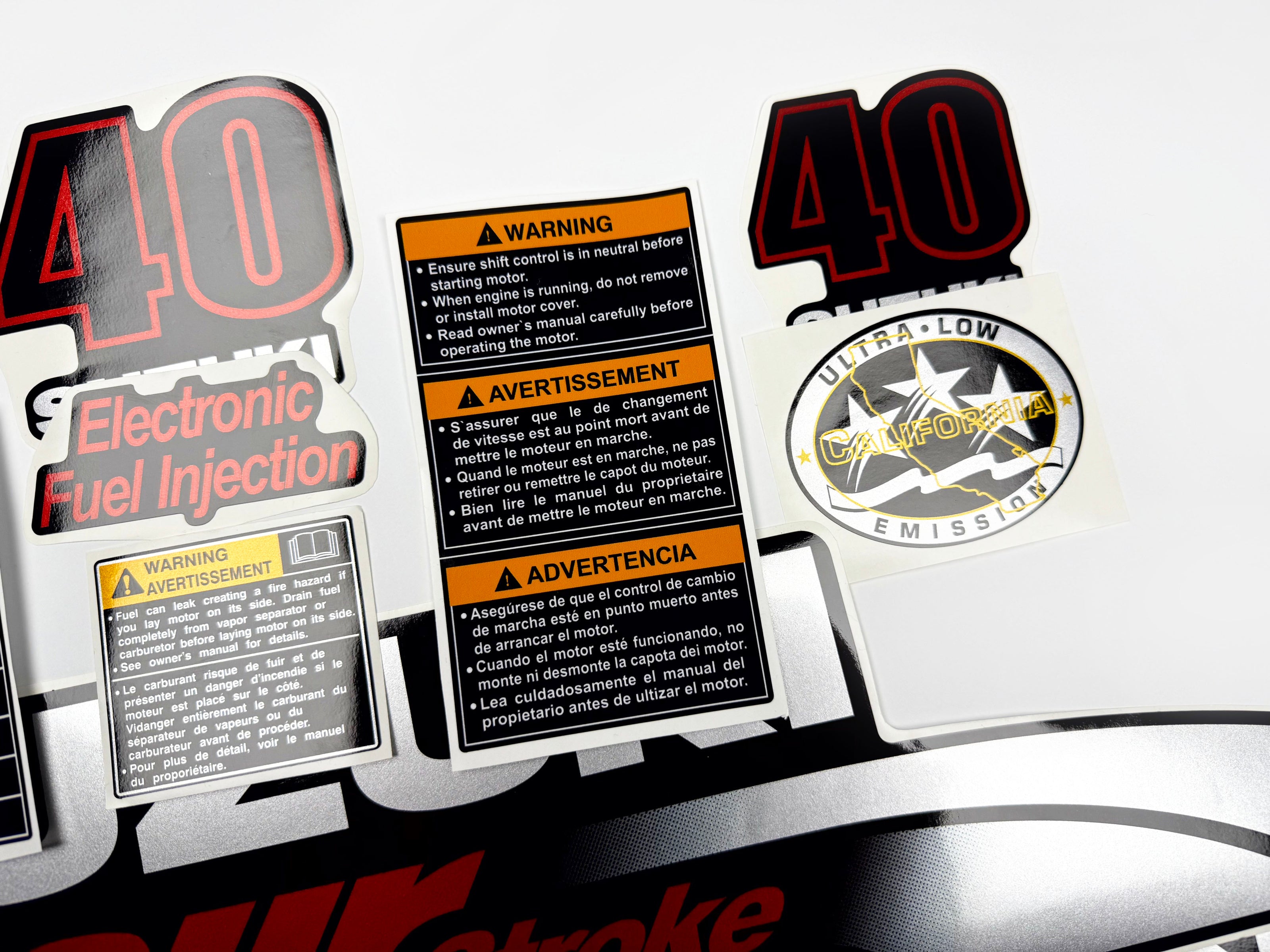 Vinyl graphic silver metalized shimmer decals set suitable for Suzuki 40 hp four stroke outboard engine. Vinyl stickers kit for suzuki 40 hp four stroke Handmade